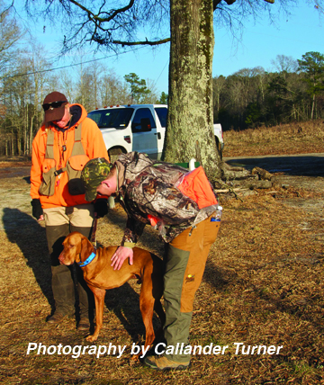 Darcy with Bart, who gets some attention from one of the Wounded Warriors members.