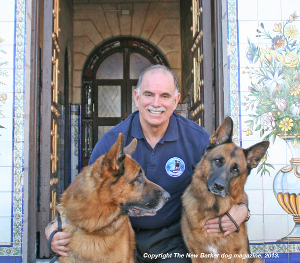 Richard Gonzmart with Rex and Rusty in front of the Columbia Restaurant, Ybor City. Photograph by Anna Cooke for The New Barker dog magazine.